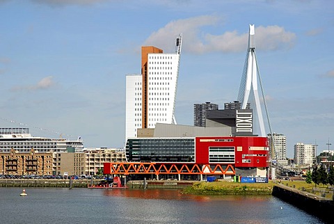 Modern architecture by the waterside: the red Luxor theatre, to the left of it the Belvedere building of the telephone company KPN Telecom and behind it the Erasmusbrug bridge, Wilhelminapier, Wilhelminaplein, Rijnhaven, Rotterdam, South Holland, the Neth