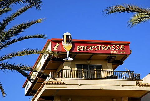 Bierstrasse 1979, palm trees and a balcony with an advertisment for beer, Platja de Palma, playa, Majorca, Balearic Islands, Spain, Europe