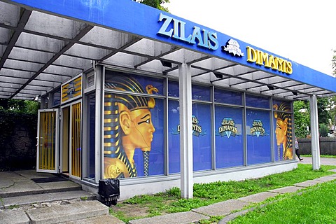 Blue marquee and glass facade with Egyptian figures, Zilais Dimants Casino in the pedestrian zone of Jomas iela street in Majori, Baltic Sea resort Jurmala, Latvia, Baltic states, northeastern Europe