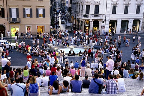 People populating Spanish Steps, Piazza di Spagna, Scalinata della Trinita dei Monti, view from above of the Via dei Condotti, Rome, Italy, Spain, Europe