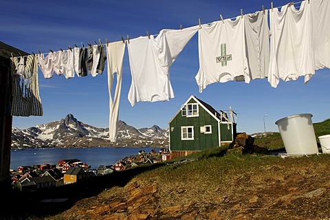 Washing line in village, Tasiilaq, Kong Oscar Fjord, Ammassalik, East Greenland, Greenland