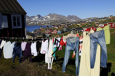 Washing line in village, Tasiilaq, Kong Oscar Fjord, Ammassalik, East Greenland, Greenland