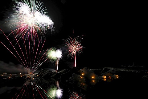 Fireworks on icebergs, glacier, Joekulsarlon, Iceland, Europe
