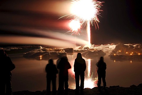 Fireworks on icebergs, glacier, Joekulsarlon, Iceland, Europe