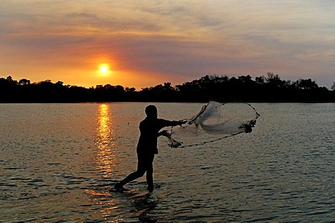 Angler at sunset, Janie Creek, Cape York Peninsula, Queensland, Australia