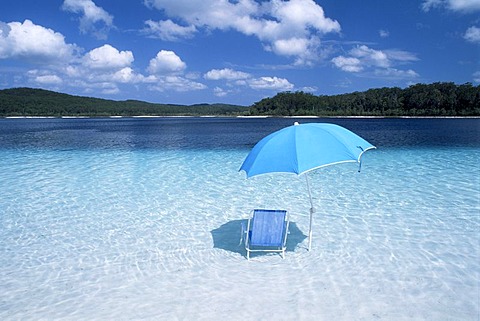 Camping chair and sunshade in the Lake McKenzie, Great Sandy, Frazer Island, National Park, Queensland, Australia