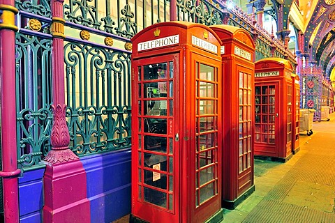 A pair of red telephone boxes at the Smithfield meat market, London, United Kingdom, Europe