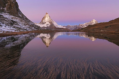 Matterhorn reflection in Riffelsee, Zermatt, Wallis, Switzerland, Europe