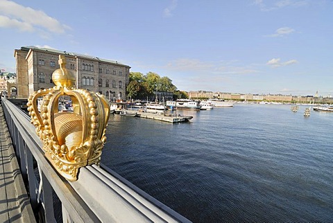 Golden Swedish crown on the handrail of a bridge, Stockholm, Sweden, Scandinavia, Europe