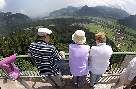 Tourists looking from the Kanzelkehre near Jenbach of the Inntal Valley in Jenbach, Tyrol, Austria, Europe