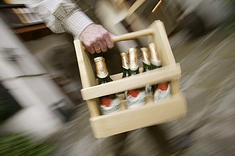 Beer bottles with Pilsner Urquell beer of the Pilsner Brewery in a wooden container, Pilsen, Plzen, Bohemia, Czech Republic, Europe.