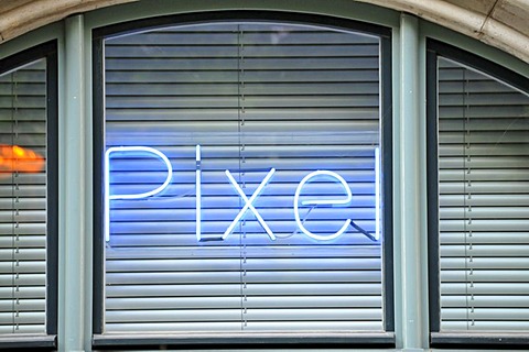 Neon signage in a window, Berlin, Germany, Europe