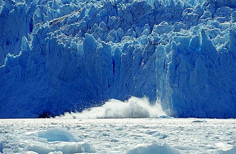 Ice falling from Chenega Glacier into the sea, Prince William Sound, Alaska, USA