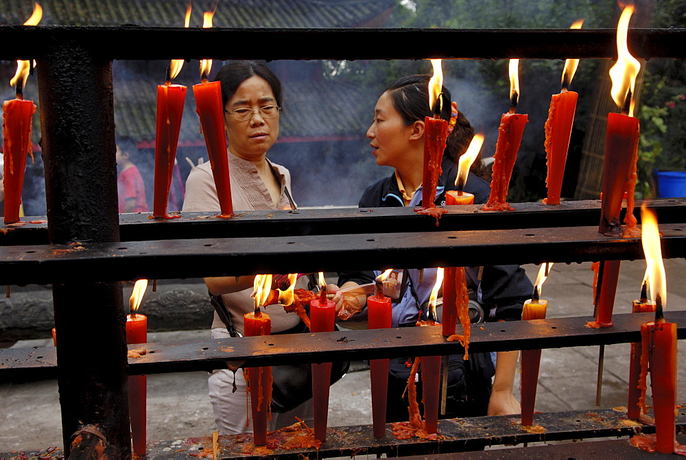 Votive candles, Wannian monastery, Mount Emei near Chengdu, China, Asia