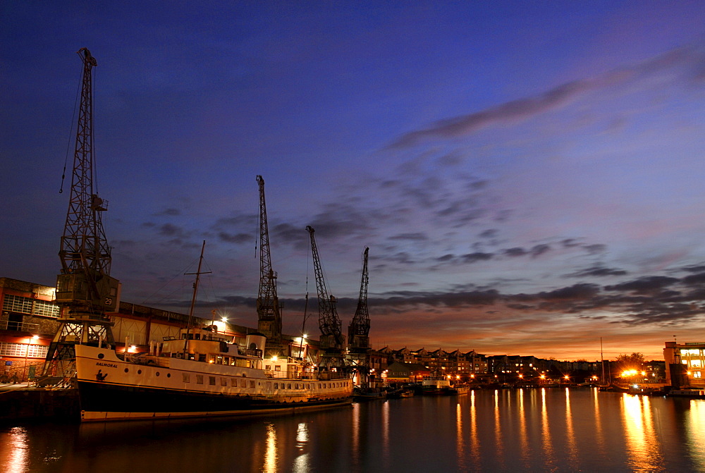 Night shot, cranes and ship in the harbour, Bristol, England, Great Britain