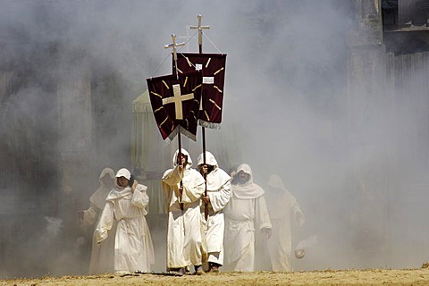 Monks in white cowls carries red flags with cross are befog, knight festival Kaltenberger Ritterspiele, Kaltenberg, Upper Bavaria, Germany