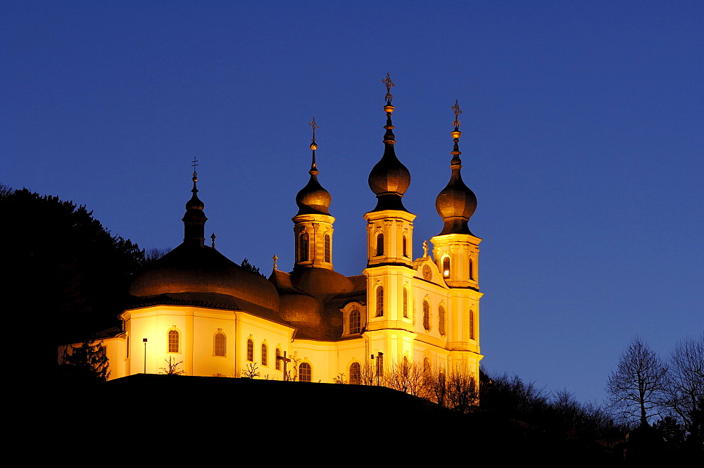 St. Maria Chapel illuminated at twilight, pilgrimage site in Wuerzburg, Bavaria, Germany