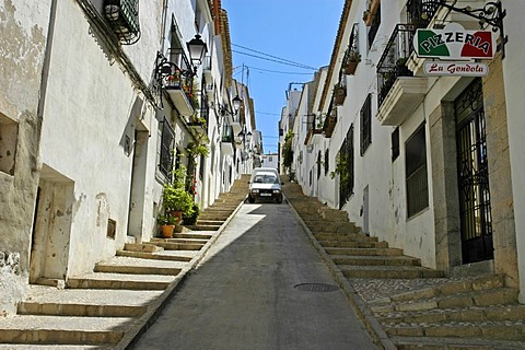 Car parking in a steep lane in the old part of town, Altea, Costa Blanca, Spain