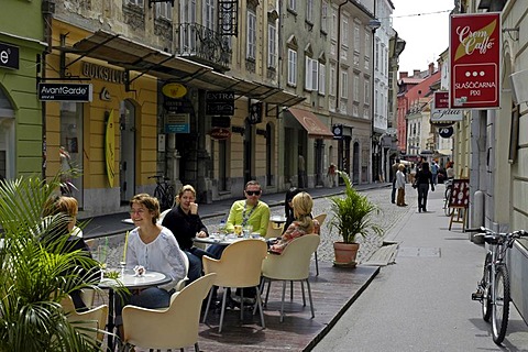 Restaurant guests in the old part of the town, Ljubljana, Slovenia