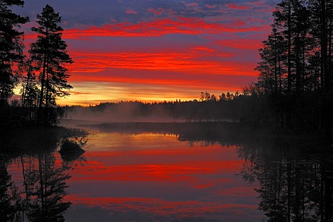 Spectacular sunrise at a Swedish raised moss lake, Dalarna, Scandinavia, Sweden, Europe