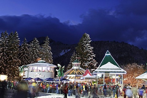 Bars and tents for the spectators around finish area first run ladies night slalom 12 29 2004 on Semmering in Lower Austria