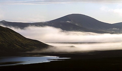 View from the Ljotipollur volcano over black lava sand fog Iceland