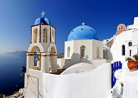 Blue cupola and a bell tower of a church, Oia, Santorini, Greece