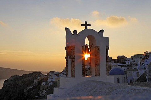 Bell tower of a chapel at sunset, Oia, Santorini, Greece