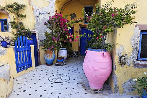 A colourful yard of a house, Oia, Santorini, Greece