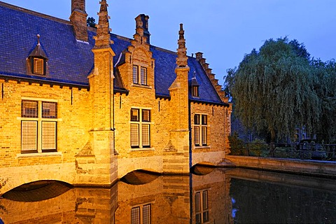 House built over the canal of the Minnewater, Brugge, Flanders, Belgium