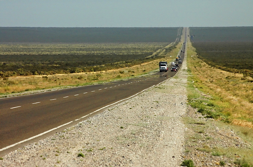 Endless roads through the seemingly infinite plane, Patagonia, Argentina