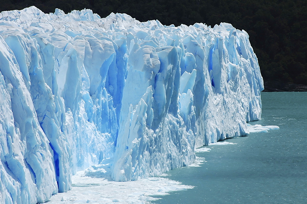 Deep blue ice of the cracking Perito Moreno Glacier, Patagonia, Argentina