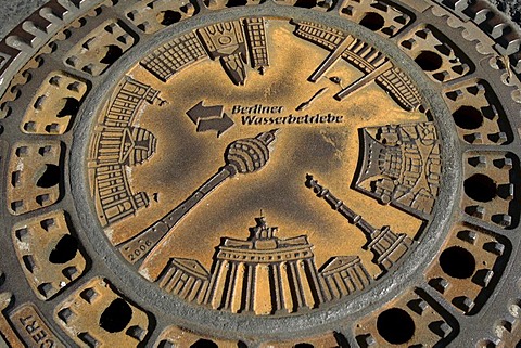 All Berlin sights on a rusty manhole cover, germany, Europe