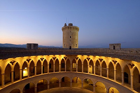 Gothic arcades at dusk, Castell de Bellver (Castle over Palma), Palma de Majorca, Majorca, Spain