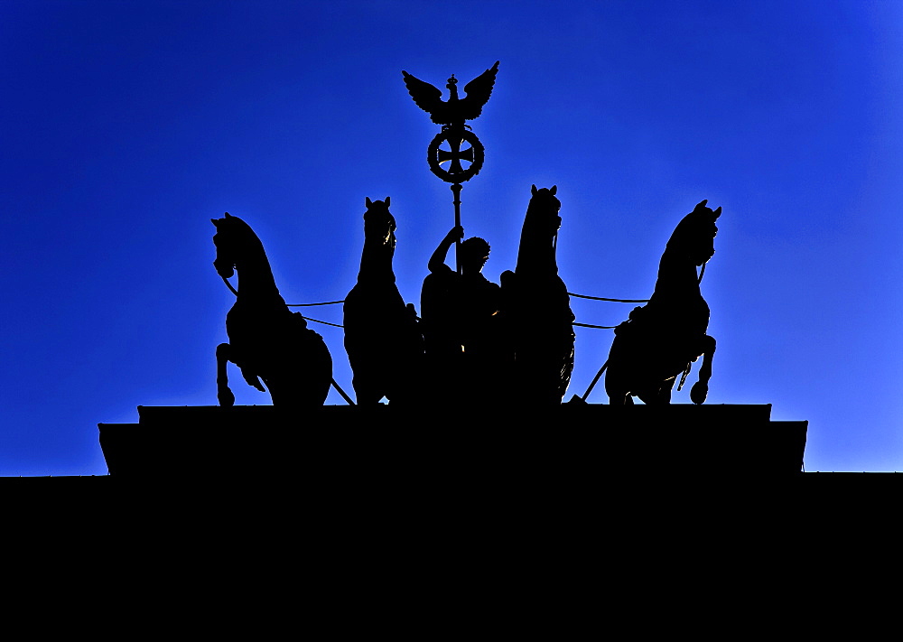 Silhouette of the quadriga on the Brandenburg Gate, Berlin, Germany