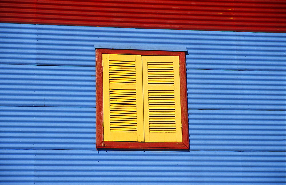 Multicoloured house front in the tourist alleys of Caminito in the docklands of La Boca, Buenos Aires, Argentina, South America