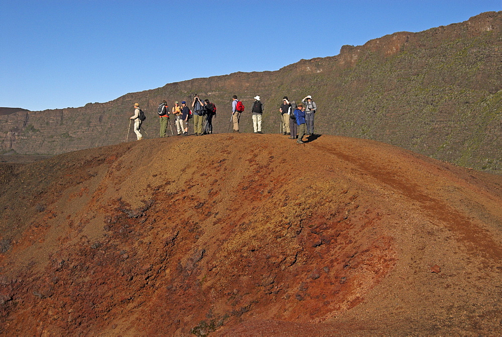 Hiker in the caldera of Piton de la Fournaise volcano, La Reunion Island, France, Africa