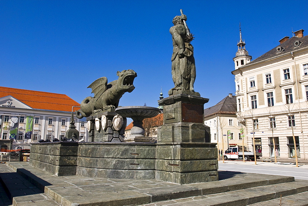 Fountain statue of a lindworm dragon attacking a man, Klagenfurt, Carinthia, Austria