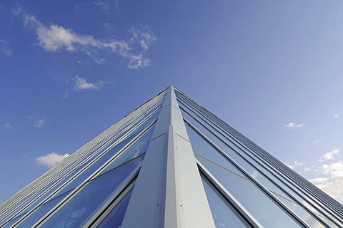 Graphic presentation of a glass pyramid against a cloudy blue sky, Muttart Conservatory, horticultural attraction, Edmonton, Alberta, Canada