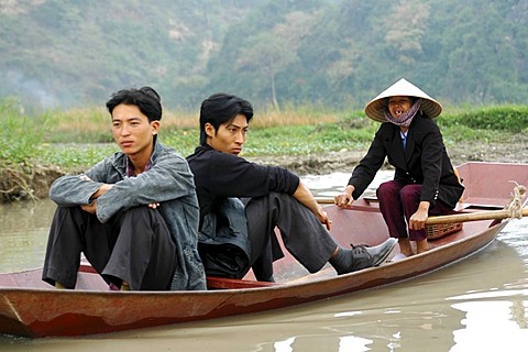 Three in a boat Perfume river Vietnam