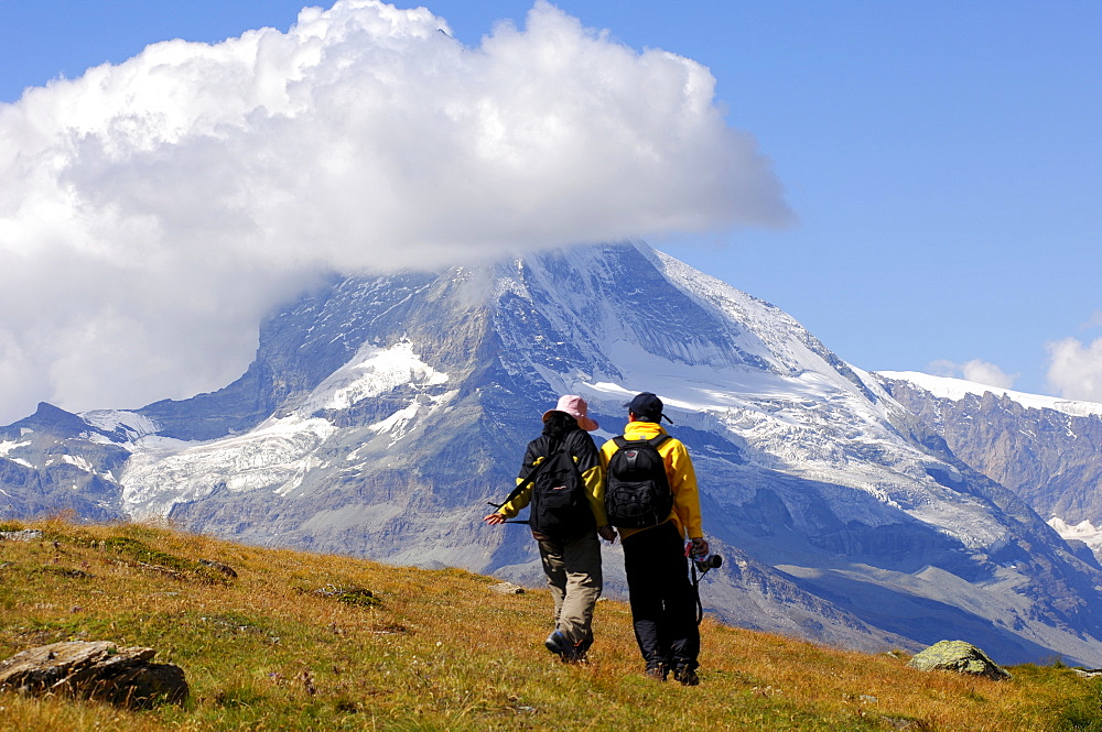 Tourists at the foot of Mount Cervin, Matterhorn, Zermatt, Switzerland