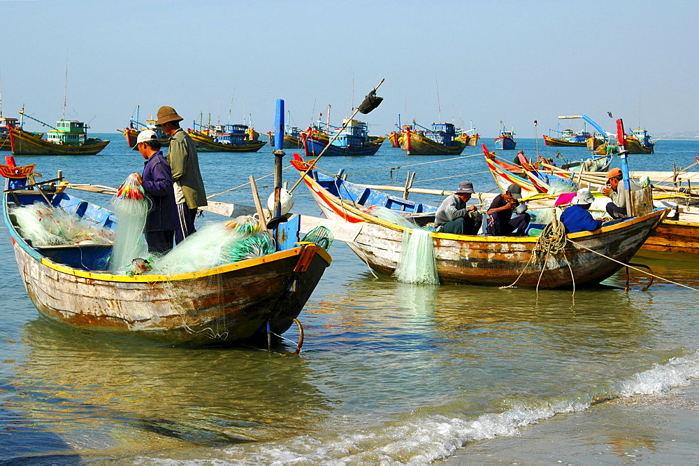 Fishing boats in the fishing port of Mui Ne in Vietnam, Southeast Asia