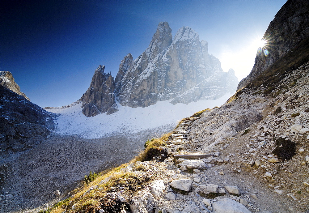 Hiking path in the Bacherntal with Zwoelferkogel, Sextenan Dolomites, South Tyrol, Italy