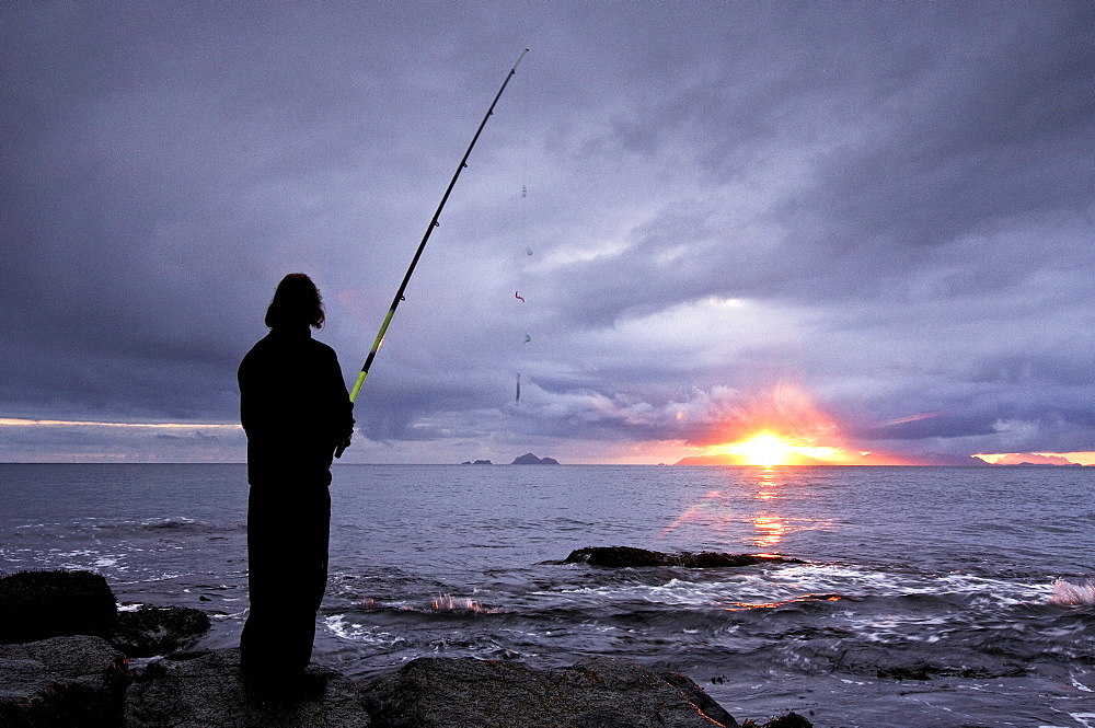 Fisherman on the beach, Lofoten Archipelago, Norway, Scandinavia, Europe