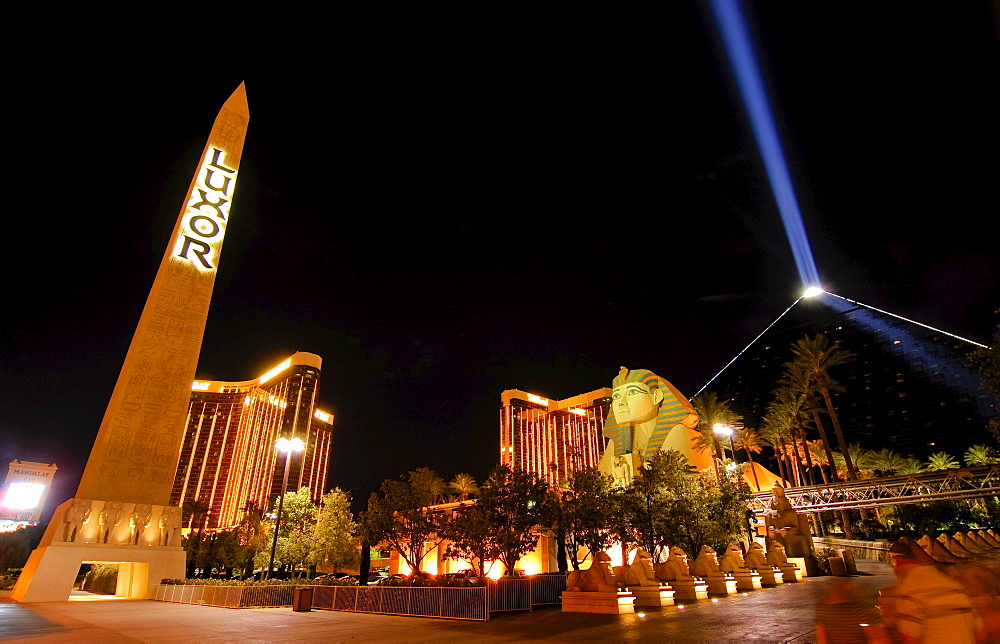 Exterior, night, sphinx replica and the "space beam, " main entrance to the Luxor Hotel & Casino, Las Vegas Boulevard, Las Vegas, Nevada, USA, North America