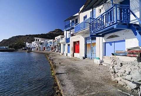 Colourful houses beside the ocean of the fishing village of Klima on Milos Island, Cyclades Island Group, Greece, Europe