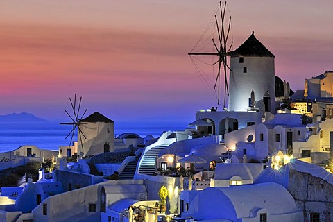 Windmills at sunset, Oia, Ia, Santorini, Cyclades, Greece, Europe