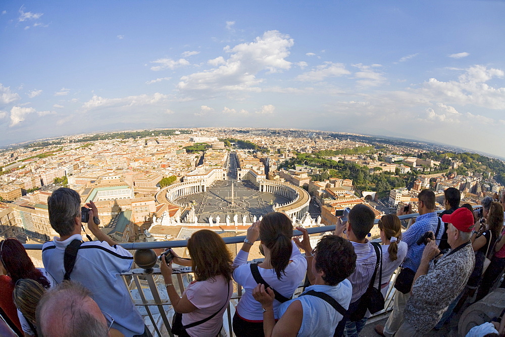 Tourists enjoying the view from the dome of St. PeterÂ¥s Basilica, Rome, Italy, Europe