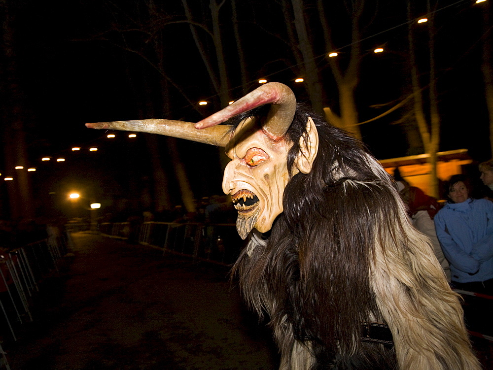 Krampus, a traditional Austrian figure bound to the tradition of St. Nicholas, he is the evil counterpart responsible for punishing and frightening the wicked children while St. Nicholas rewards the honest children, Reichenau at Mt. Rax, Lower Austria, Au