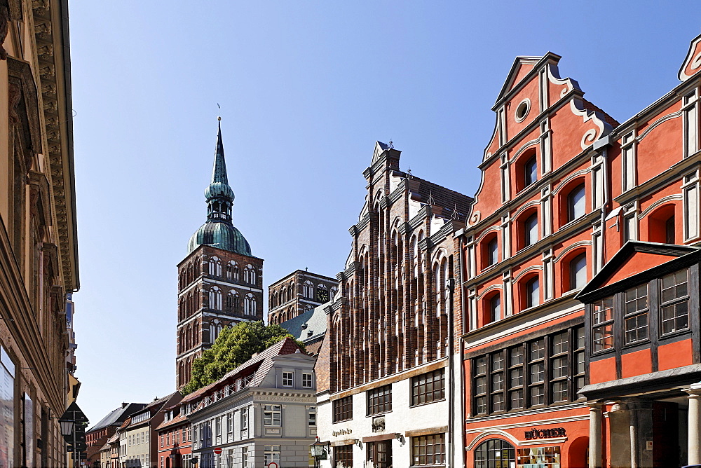 View of pharmacy and St. Nicholas Church in background, Badenstrasse, Stralsund, Mecklenburg-Western Pomerania, Germany, Europe